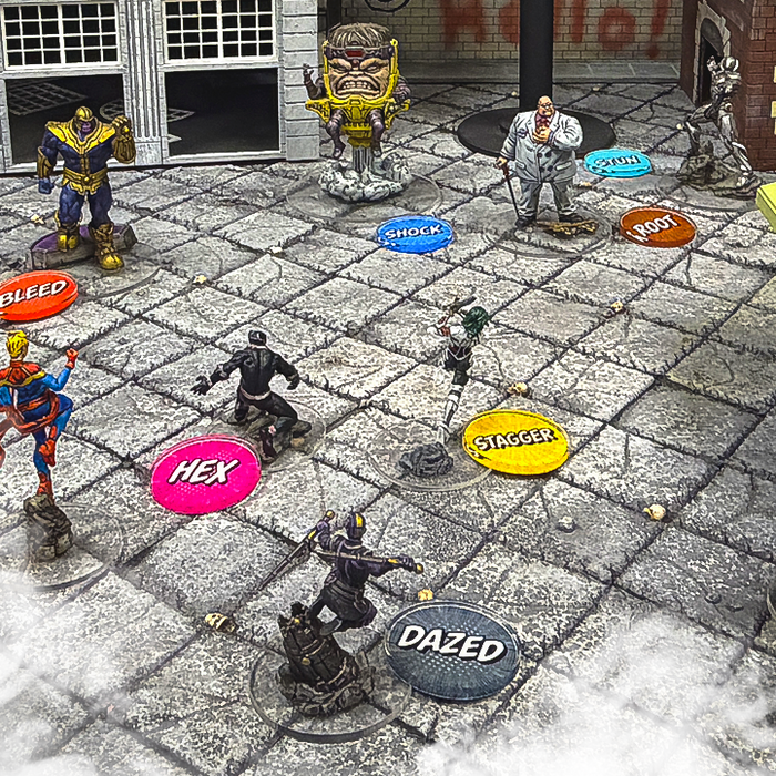 LITKO status tokens such as Bleed, Hex, Stagger and Dazed placed beside miniatures on a city street game table