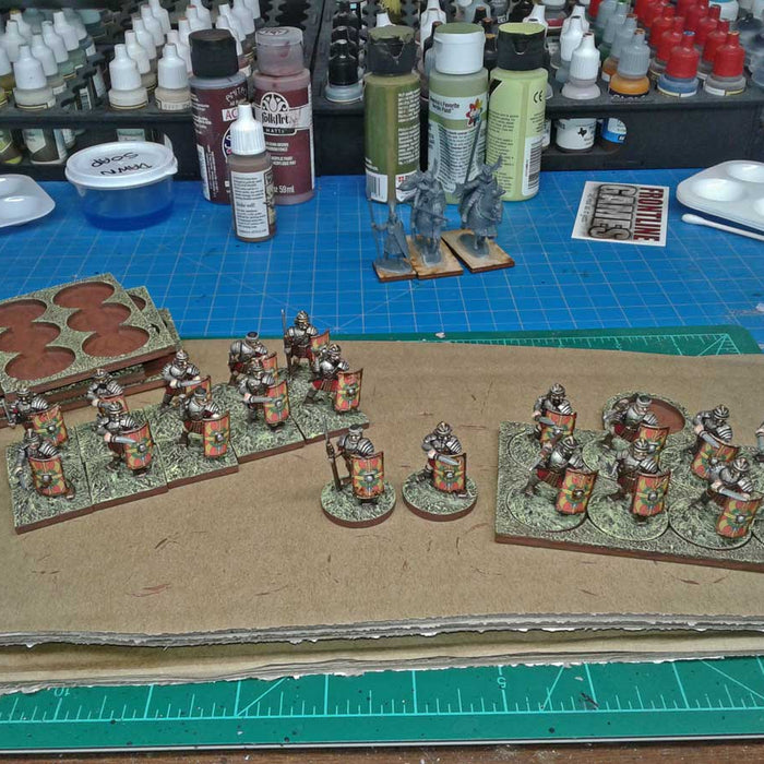 Painting and finishing Roman minis. Displayed on LITKO Movement Trays