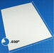 Close-up side view of a 0.030-inch thick styrene sheet demonstrating the thin profile used for fine model detailing.