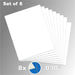 Product image displaying a fanned-out set of 8 white 8x10 inch styrene sheets for the 0.030-inch Plasticard Pack.