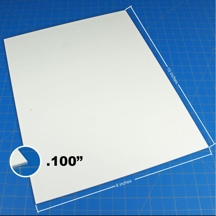 Close-up side view of a 0.100-inch thick styrene sheet demonstrating the thin profile used for fine model detailing.