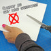 Product graphic of a hand attempting to cut a thick 0.100-inch white styrene sheet with scissors, featuring a red "no" symbol and text stating it cannot be cut with scissors.